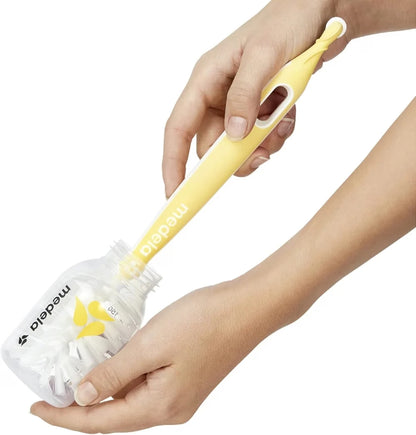 Goupillon Medela avec support pour biberon